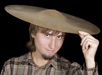 man wearing a cymbal for a hat