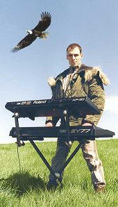 Mark J Cairns - photo with keyboards and eagle